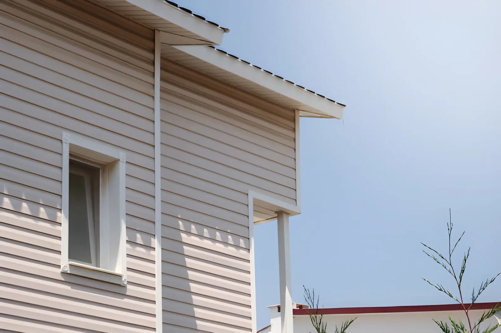 Transformation of siding and exterior walls showing improved structure and aesthetics