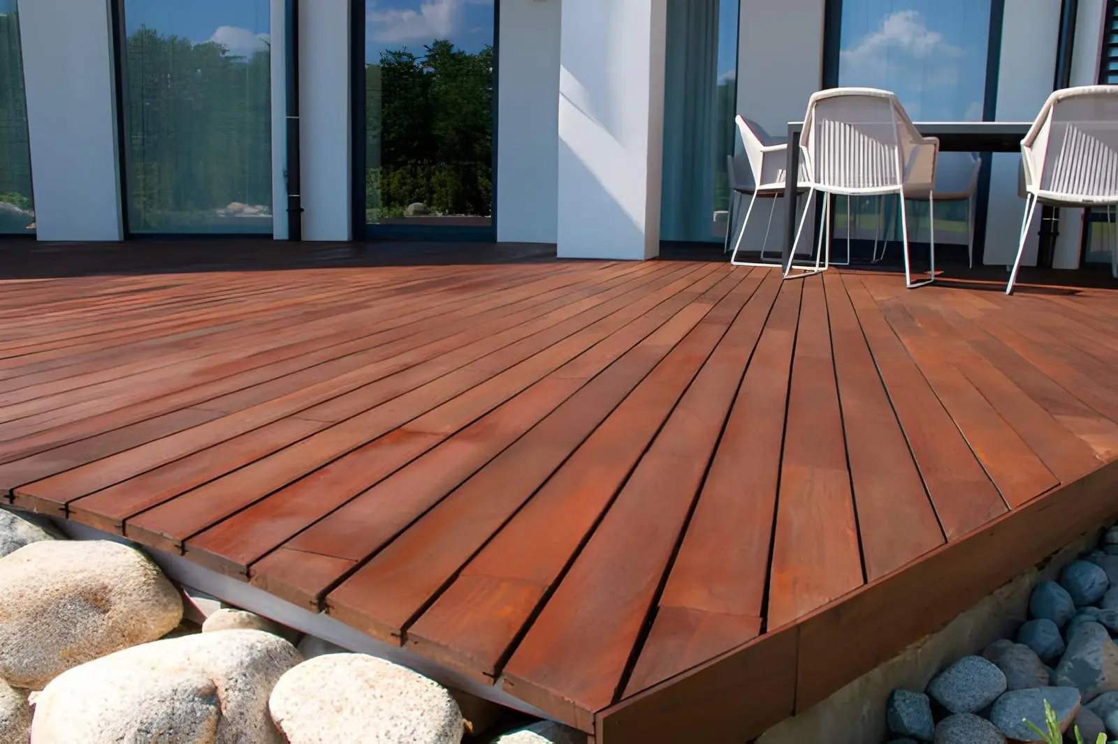 Beautiful modern decks & outdoor living space with stylish seating and wood finish