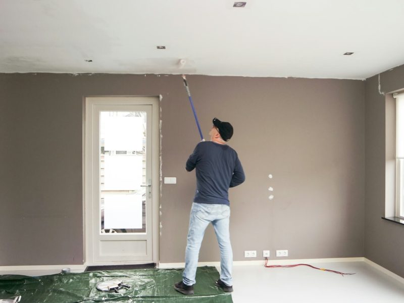 man-full-length-painting-the-ceiling-home-renovation-jpg